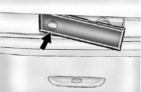 Access the storage area by pressing and holding in the driver side of the handle and pull out on the exposed portion of the handle.