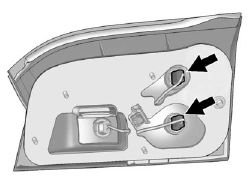 6. Turn the bulb socket counterclockwise and pull it out.