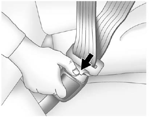 To unlatch the belt, push the button on the buckle. The belt should return to its stowed position. Slide the latch plate up the safety belt webbing when the safety belt is not in use. The latch plate should rest on the stitching on the safety belt, near the guide loop on the side wall.