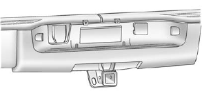 For vehicles equipped with heavy duty trailering, the harness connector is mounted in the bumper.