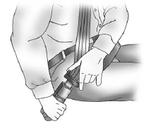 3. Push the latch plate into the buckle until it clicks. Pull up on the latch