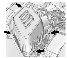 3. Remove the four air cleaner housing cover screws.