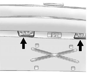 2. Turn and pull the license plate lamp forward through the liftgate trim opening.