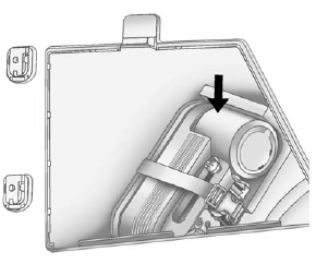 1. Press down on the latch tab and pull the cover off to access the storage compartment.