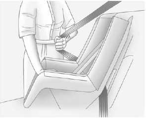 4. Pull the shoulder belt all the way out of the retractor to set the lock. When the retractor lock is set, the belt can be tightened but not pulled out of the retractor.