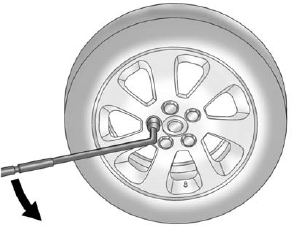 3. Use the wheel wrench and turn it counterclockwise to loosen the wheel nuts. Do not remove the wheel nuts yet.