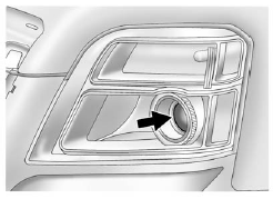 2. Locate the aim dot on the lens of the low&-beam headlamp.